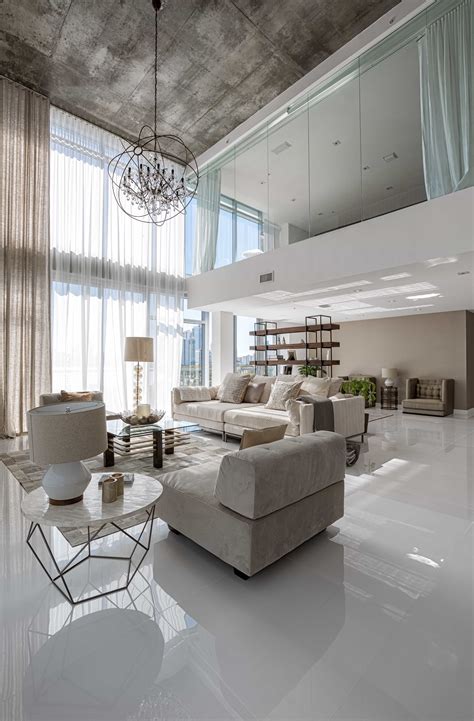 Luxury Apartment Living Room With High Ceiling And Metallic Accent