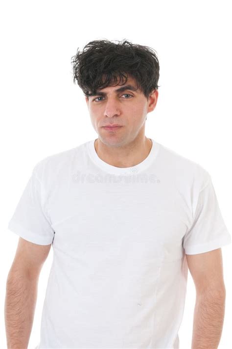 Portrait Of A Man In A White Shirt On A Blue Background Stock Image