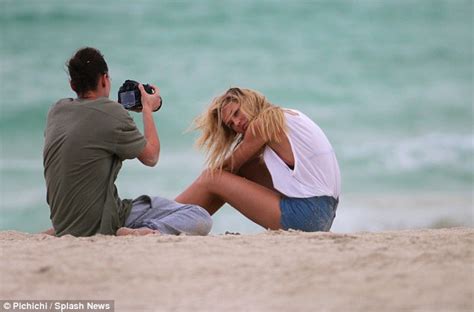 Candice Swanepoel Braves The Blustery Beach For Bikini Fashion Shoot In