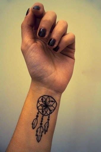 Small Dreamcatcher Tattoo On Left Wrist