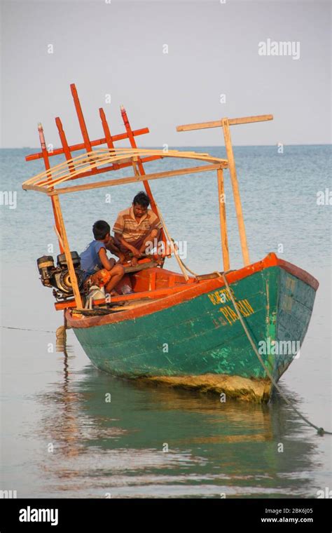 Two Persons On A Boat On The Sea In Cambodia Stock Photo Alamy