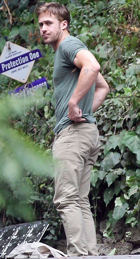 Hunky Ryan Gosling Reveals A Rip In The Armpit Of His T Shirt As He