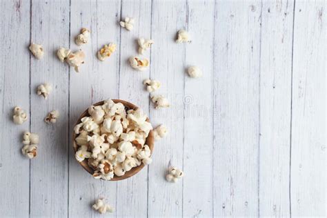 Salt Popcorn On The Wooden Table Popcorn In A Wooden Bowl Stock Image