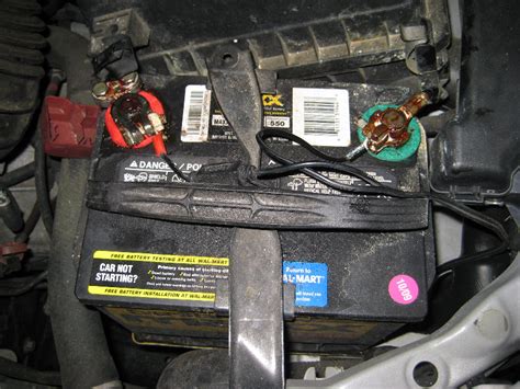 When the coke has finished bubbling, take a wire brush and brush away any corrosion that is stuck around bolts or any other hard to reach areas. How-To-Clean-and-Stop-Car-Battery-Terminal-Corrosion-019