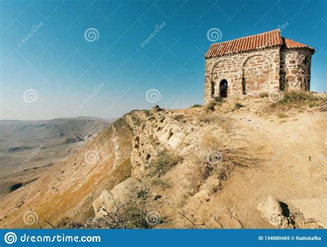 Old Stone Building On Mountains Over Beautiful Natural Landscape Stock