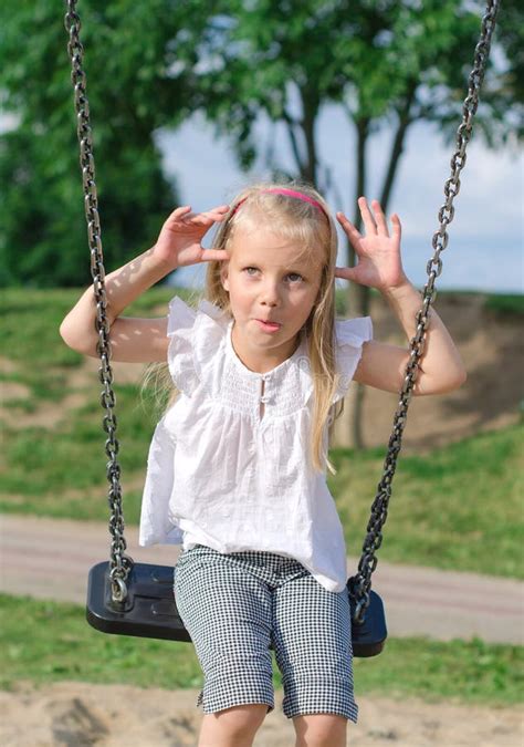 Little Girl On Swing Stock Photo Image Of Delight Activity 32040878
