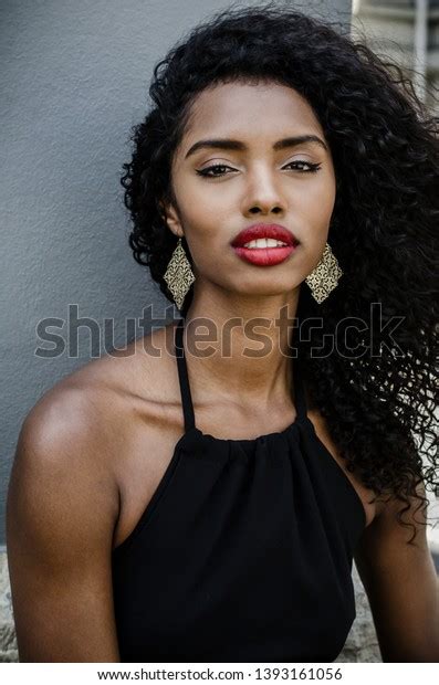 Fashionable Black Woman Red Lips Sitting Stock Photo 1393161056