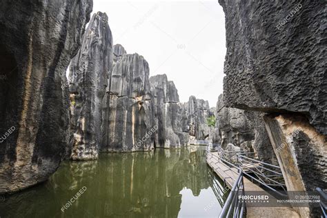 China Shilin Stone Forest Lake And Path — Outdoors Rocky Stock
