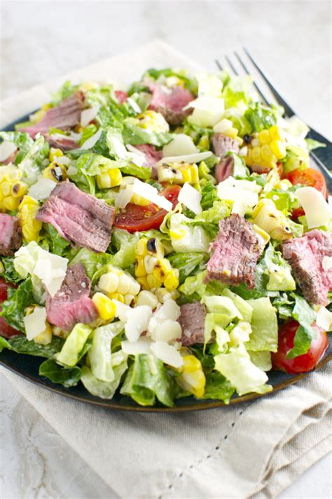 Looking for the best steaks to grill? Steak and Corn Caesar Salad - Stuck On Sweet