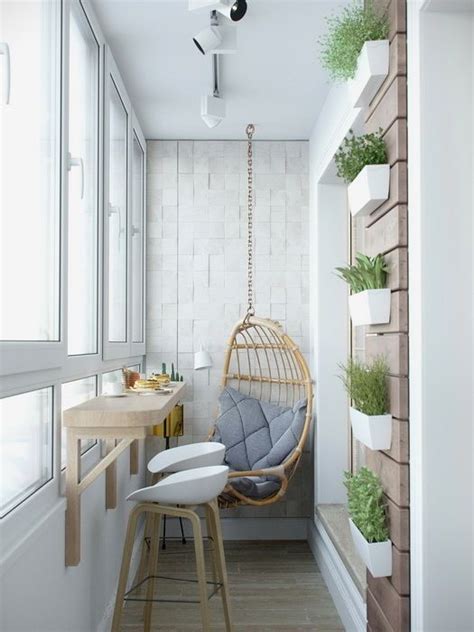 An Instagramted Photo Of A Room With Plants On The Wall And Hanging Chair