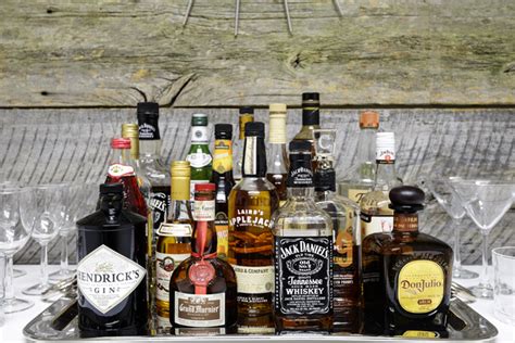 must have liquors and mixers for your home bar