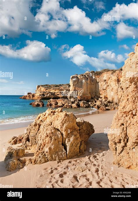 Golden Beaches And Sandstone Cliffs Near Albufeira Portugal Stock