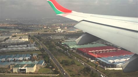 E190 Kenya Airways Lands At Jomo Kenyatta Airport Nairobi Youtube