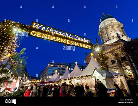 Night View Of Busy Traditional German Christmas Market In