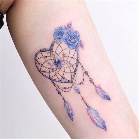 Heart Shaped Dream Catcher Tattoo On Back Watercolor Pink Blue Roses On The Side Inside Of Arm