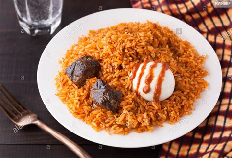 The sudden change of temperature can lead to shocked, or unevenly cooked, eggs or even worse—cracked, damaged. How To Cook Jollof Rice With Egg Or Boiled Egg : Soft ...