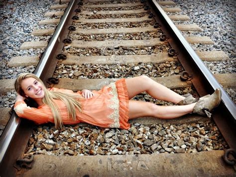 Railroad Track Photo Shoot Girl Wearing Dress And Boots Poses On Railroad Track Excellent