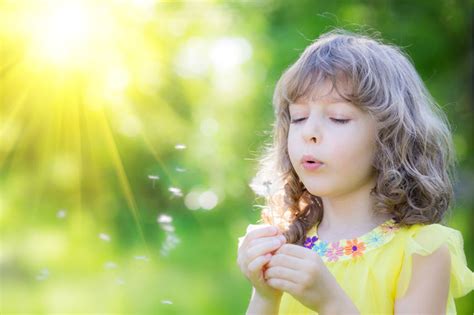73219327-happy-child-blowing-dandelion-flower-outdoors-reverse - Bamboo ...