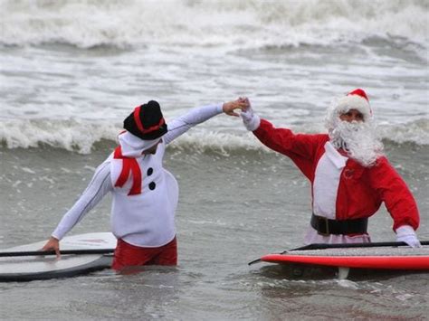 Ho Ho Hang Ten Surfin Santas Catching A Worldly Wave
