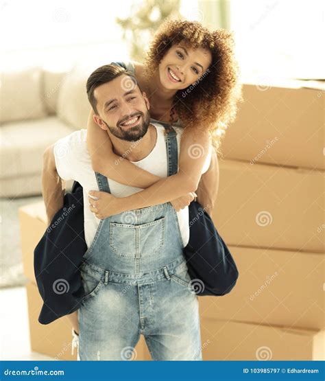 Portrait Of A Couple In Love In A New Empty Apartment Stock Image