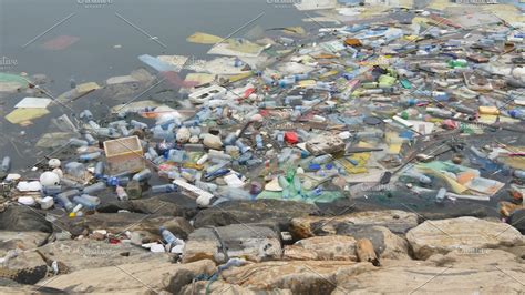 Environmental Pollution Plastic Bottles Bags Trash In River Or Lake