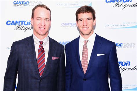 Eli Mannings Photo With Another Football Player Going Viral The Spun