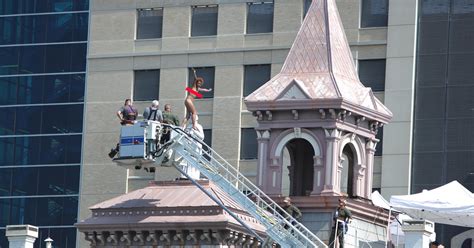 Naked Woman Climbs Atop Saint Patrick Cathedral Statue Sits Stands