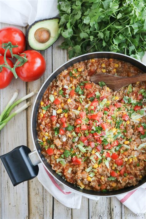 Almost any side—noodles, veggies or bread—tastes better next to this lovely chicken. One-Pot Mexican Rice Skillet Dinner - Two Healthy Kitchens