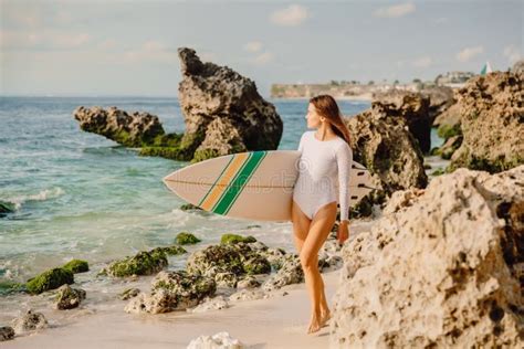Surf Woman With Surfboard On Beach Attractive Surfer Girl Stock Image