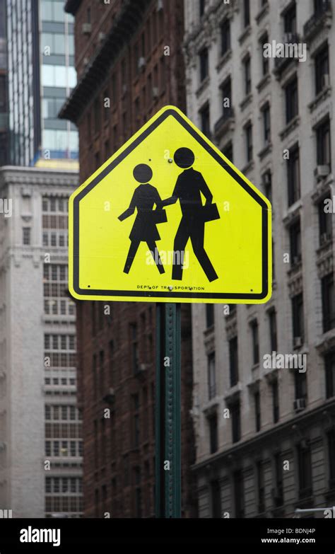 A Pedestrian Crossing Warning Sign In New York City United States