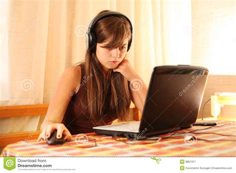 Teenage girl using laptop stock image. Image of people - 8861311
