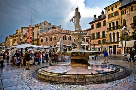 Want to discover all there is to do in piazza delle erbe? Verona, Piazza Erbe, fontana Madonna Verona | Copyright ...