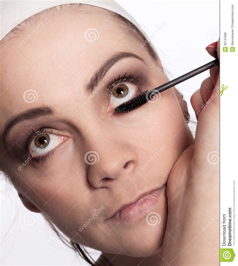 Painting Of Women Eyelashes Using Mascara Stock Photo