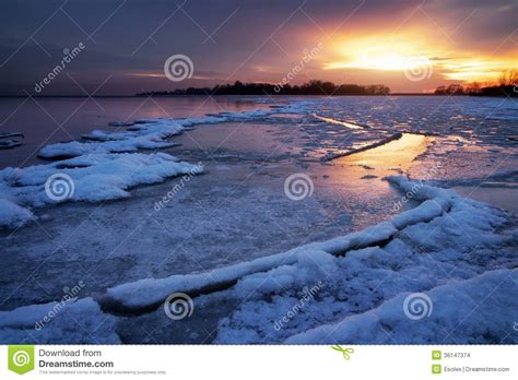 Winter Landscape With Frozen Lake And Sunset Sky Stock Photo Image