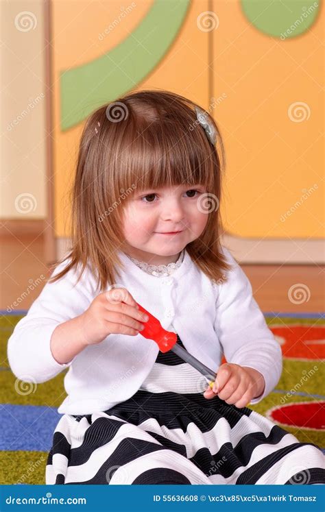 Two Year Girl Playing And Learning In Preschool Stock Photo Image Of