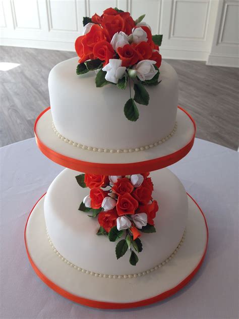 Lovely Orange Flowers On A Wedding Cake That We Had From A Lovely