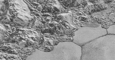 New Nasa Photos Show Plutos Surface In Eye Popping Detail