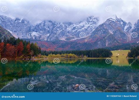 Beautiful Lago Di Fusine Mountain Lake In Autumn And Mangart Mountain