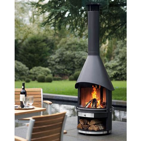 A Black Varnished Stainless Steel Garden Fireplace With A Double Sided