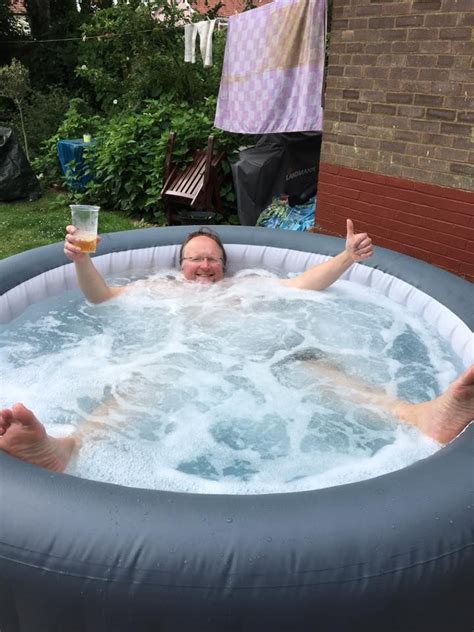 Unwinding With A Drink In His Lay Z Spa Spa Hot Tubs Hot Tub