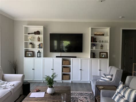 If you've built your own billy bookcase, but are looking to add some elegance to the piece, then consider adding some glass doors to the unit. DIY Faux "Built-Ins" with IKEA Billy Bookcases | The ...