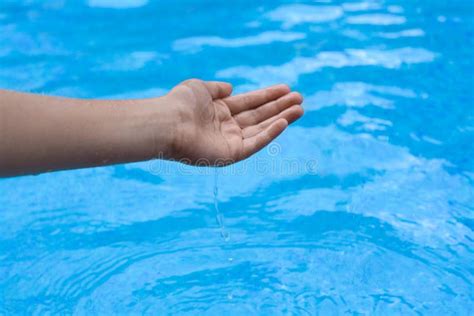 Girl Pouring Water From Hand In Pool Closeup Stock Photo Image Of