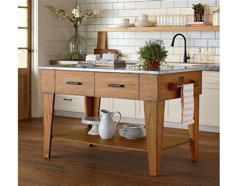 The secret is in the high contrast, says fixer upper's joanna gaines, which adds a 'wow' factor to even the most basic of kitchens. Magnolia Home by Joanna Gaines Farmhouse Kitchen Island Bench Stain #farmhousekitchenDesign ...