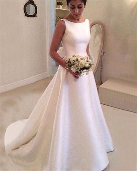 The site only stocks cleaning wedding dresses of the finest quality that have been checked for any damages or defects. Simple Elegant Boat Neck Satin A Line Bridal Dress Women ...
