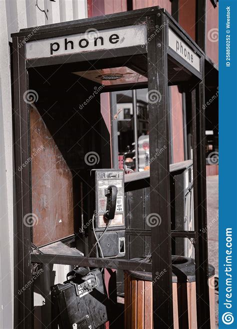 Vertical Shot Of Vintage Phone Booth On The Street Stock Photo Image