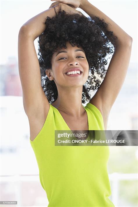 Portrait Of A Smiling Woman Posing High Res Stock Photo Getty Images