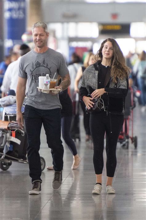 Lana del rey and her cop boyfriend sean sticks larkin are officially no more. Lana Del Rey and boyfriend Sean Larkin - Arrives at JFK ...