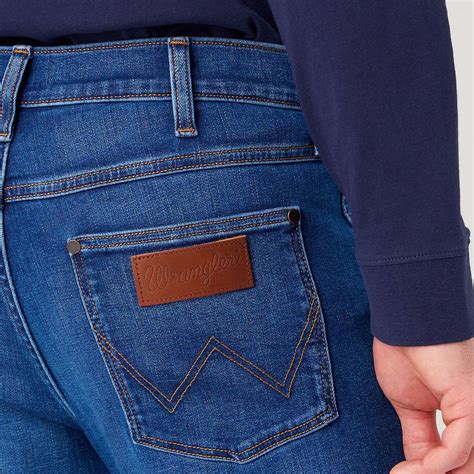 Wrangler Larston 812 Slim Taper Stretch Denim Jeans In Orion