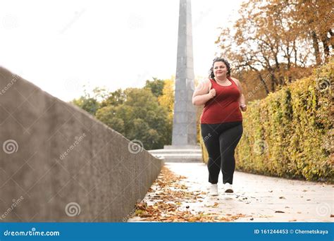 Beautiful Overweight Woman Running In Park Stock Image Image Of Overweight Park 161244453