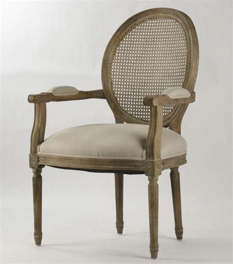 The frame is constructed of solid ash wood and inlayed with a woven. Louis XVI arm chair. Limed grey oak wood with oval cane ...